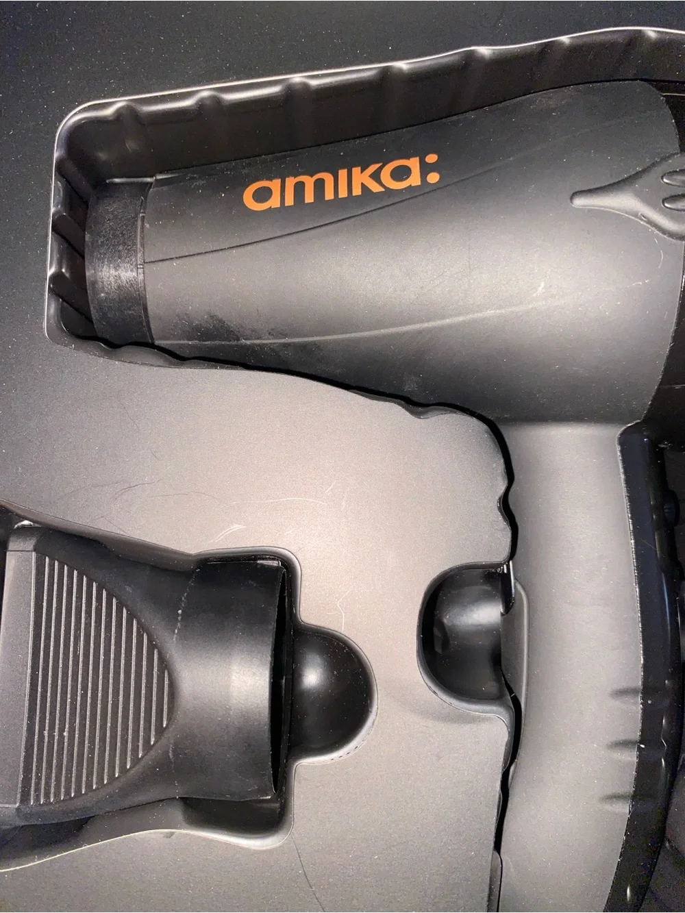 amika Black Professional Hair Dryer with Orange Logo